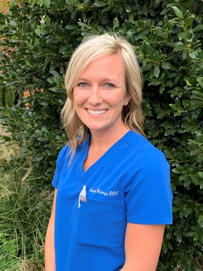Outdoor photo of our dentist and owner, Christy Heinze DDS